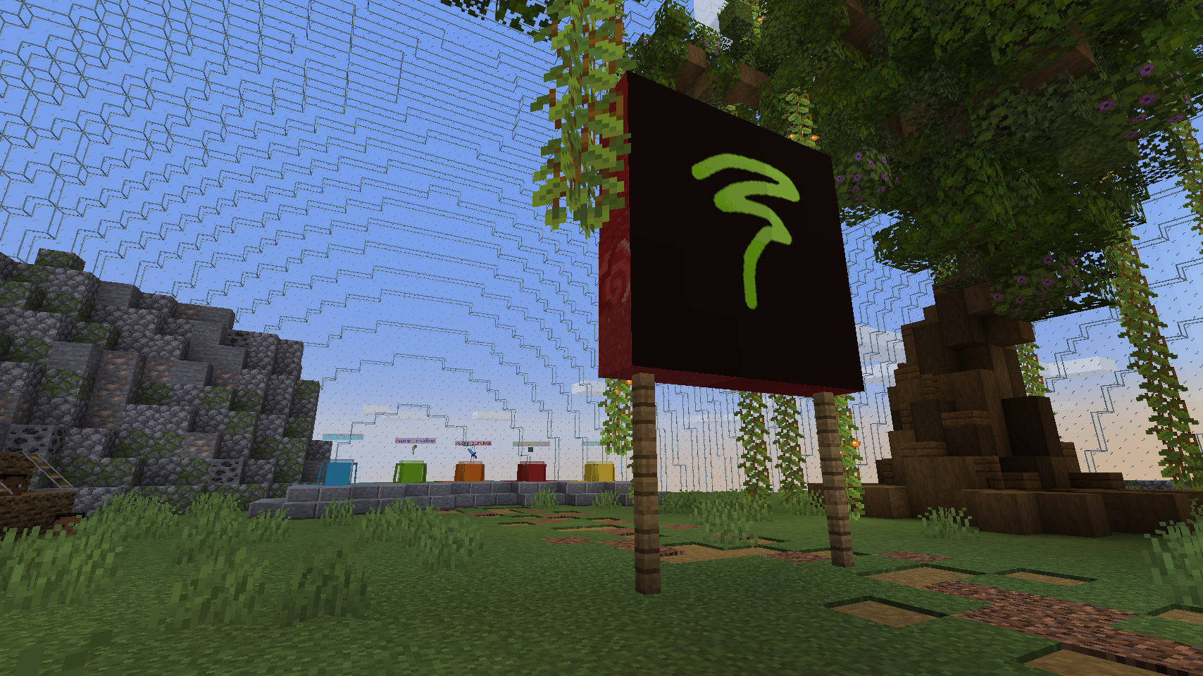 man watching a band on the stage wearing a red t-shirt and black hat.